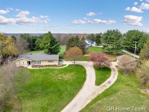 Photo of 867 Cramton Avenue NE, Ada, MI 49301 (MLS # 26017311)