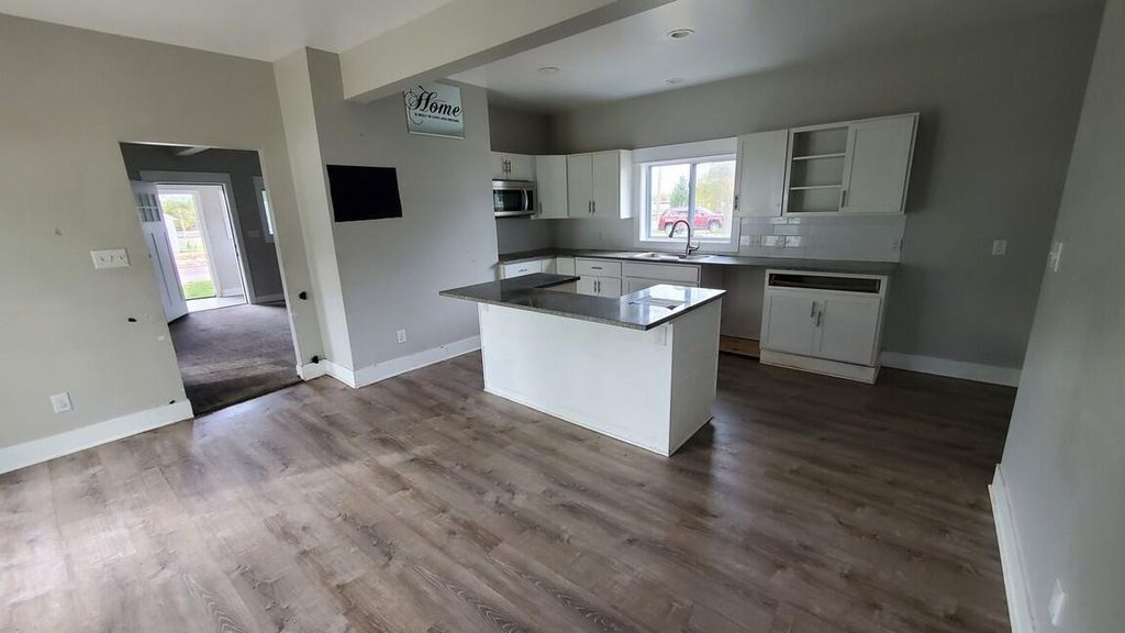 Photo of 913 N Monroe Street SE, Lowell, MI 49331 (MLS # 25055358)