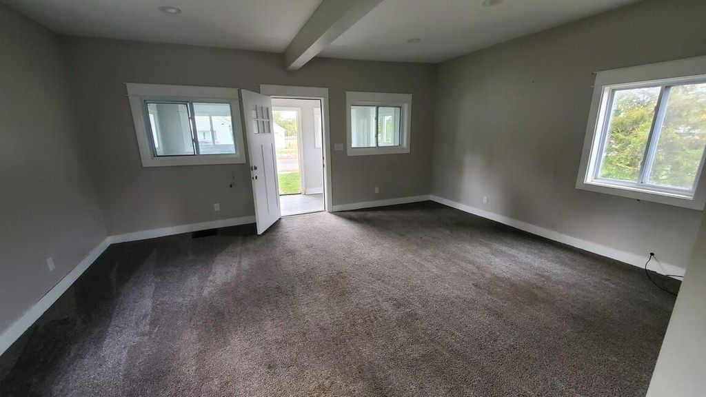 Photo of 913 N Monroe Street SE, Lowell, MI 49331 (MLS # 25055358)