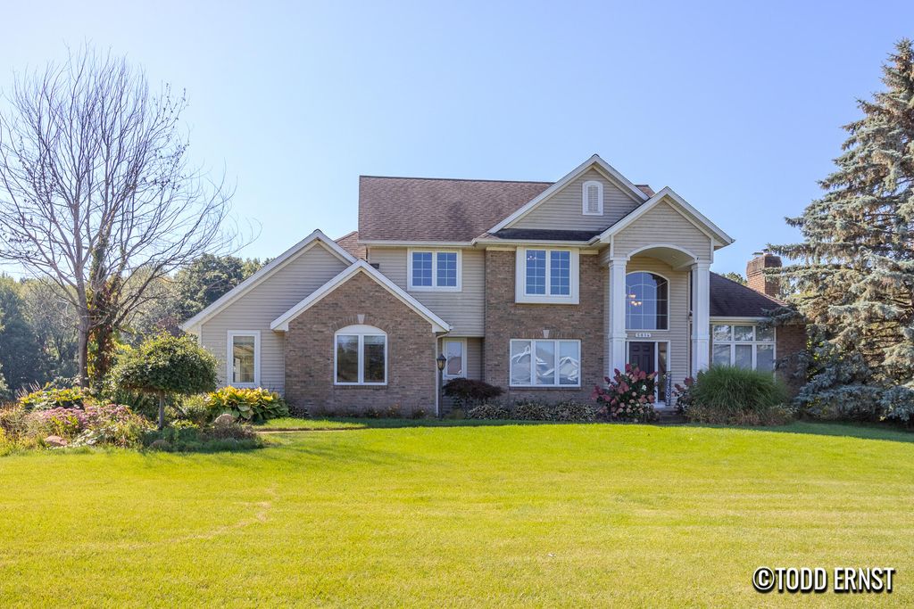 Photo of 5814 Cannon Hills Drive NE, Ada, MI 49301 (MLS # 25046882)