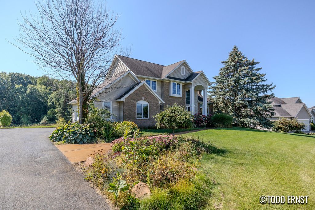 Photo of 5814 Cannon Hills Drive NE, Ada, MI 49301 (MLS # 25046882)