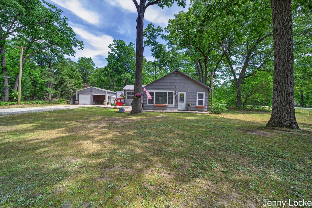 Photo of 588 N Mill Iron Road, Muskegon, MI 49442 (MLS # 26027505)