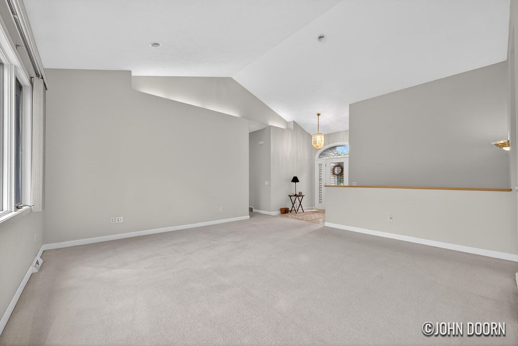 Photo of 57 Rollingbrook Drive NE, Ada, MI 49301 (MLS # 26022089)