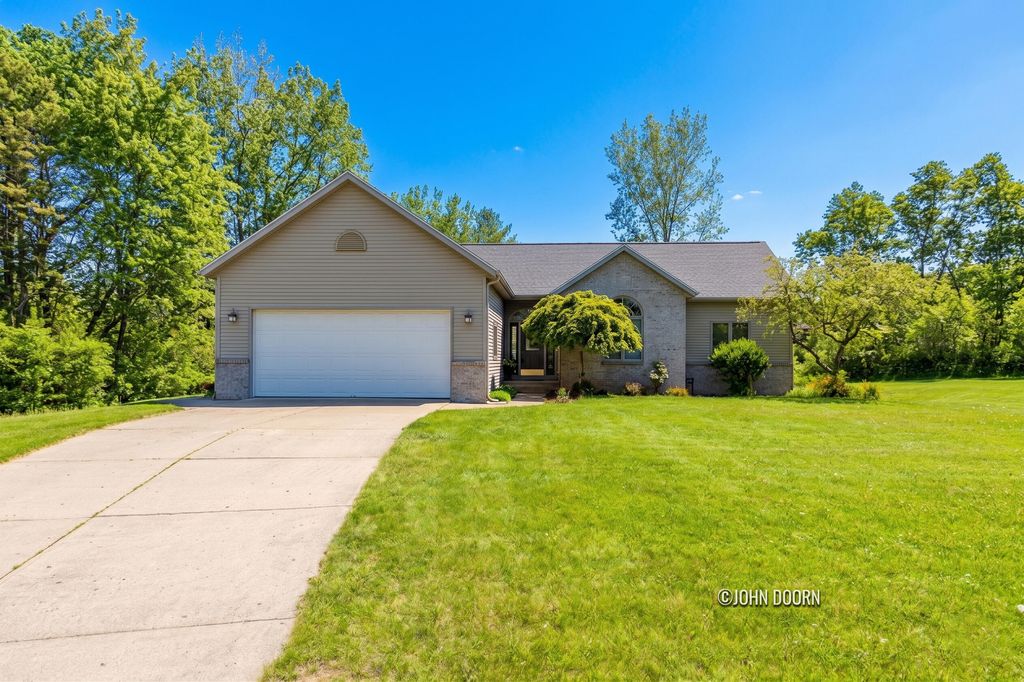 Photo of 57 Rollingbrook Drive NE, Ada, MI 49301 (MLS # 26022089)