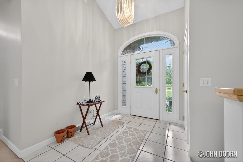 Photo of 57 Rollingbrook Drive NE, Ada, MI 49301 (MLS # 26022089)