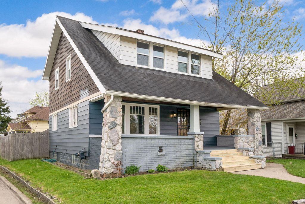 Photo of 726 Myrtle Street NW, Grand Rapids, MI 49504 (MLS # 23024947)