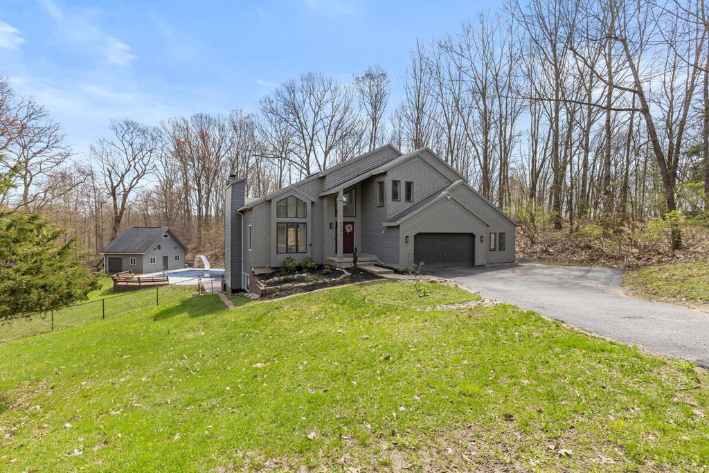 Photo of 7721 Sun Quest Ridge Drive NE, Ada, MI 49301 (MLS # 26018221)