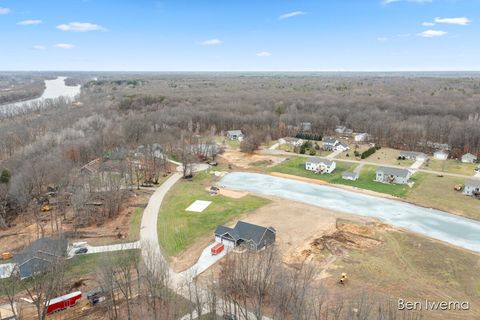 Photo of 9071 Weston Drive, Coopersville, MI 49404 (MLS # 25004065)