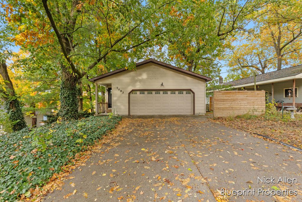 Photo of 7093 Peninsula Drive NE, Rockford, MI 49341 (MLS # 26006233)