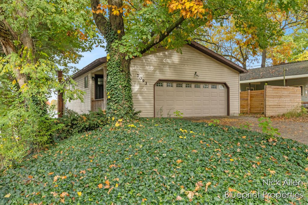 Photo of 7093 Peninsula Drive NE, Rockford, MI 49341 (MLS # 26006233)