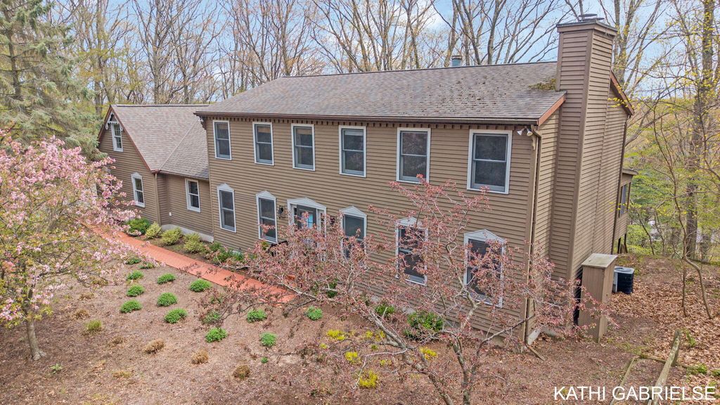 Photo of 313 Stickney Ridge Road, Grand Haven, MI 49417 (MLS # 26020655)