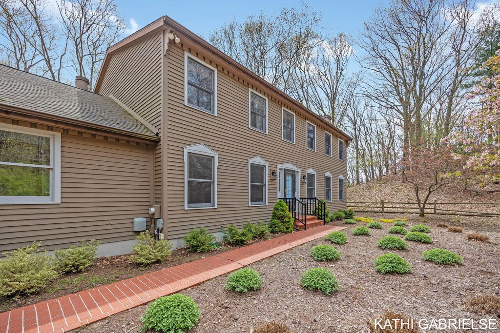 Photo of 313 Stickney Ridge Road, Grand Haven, MI 49417 (MLS # 26020655)