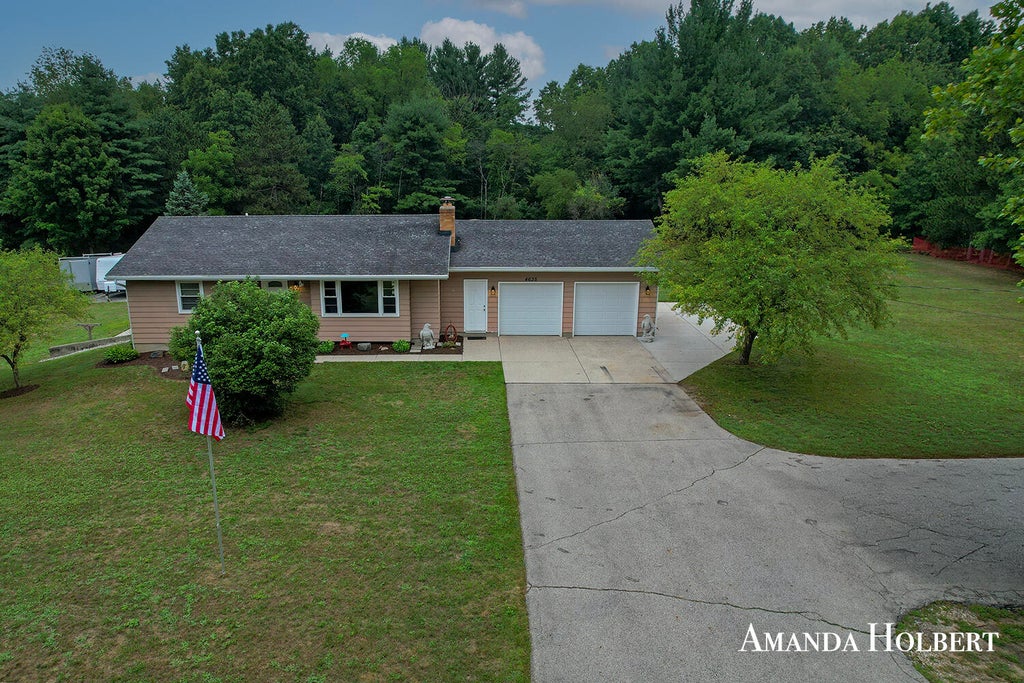 Photo of 4635 12 Mile Road NE, Rockford, MI 49341 (MLS # 26042278)