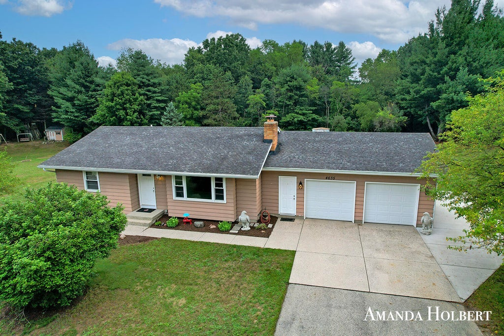 Photo of 4635 12 Mile Road NE, Rockford, MI 49341 (MLS # 26042278)