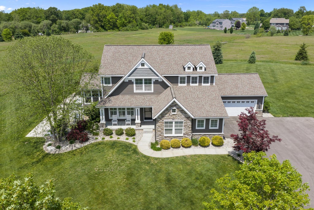 Photo of 5308 Settlers Grove Road NE, Ada, MI 49301 (MLS # 26025373)