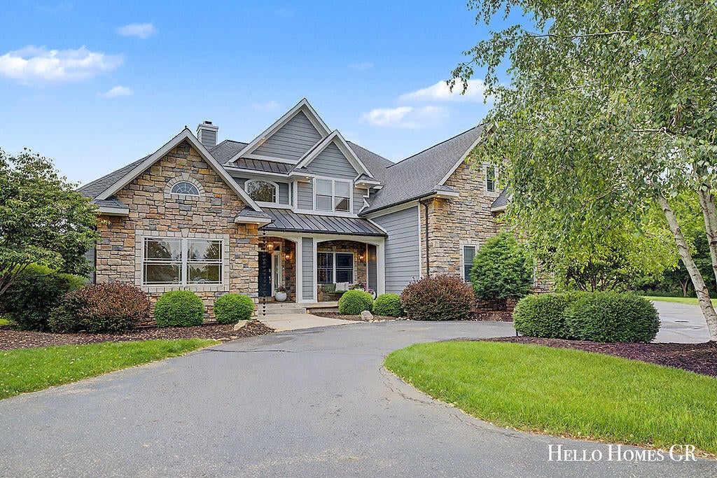 Photo of 5327 Canyon River Drive NE, Ada, MI 49301 (MLS # 26048337)