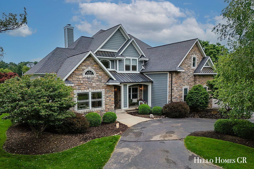 Photo of 5327 Canyon River Drive NE, Ada, MI 49301 (MLS # 26048337)