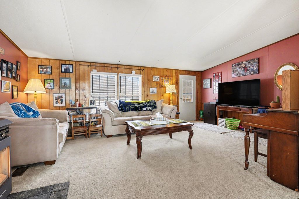 Photo of 11817 21 Mile Road NE, Sand Lake, MI 49343 (MLS # 26005255)