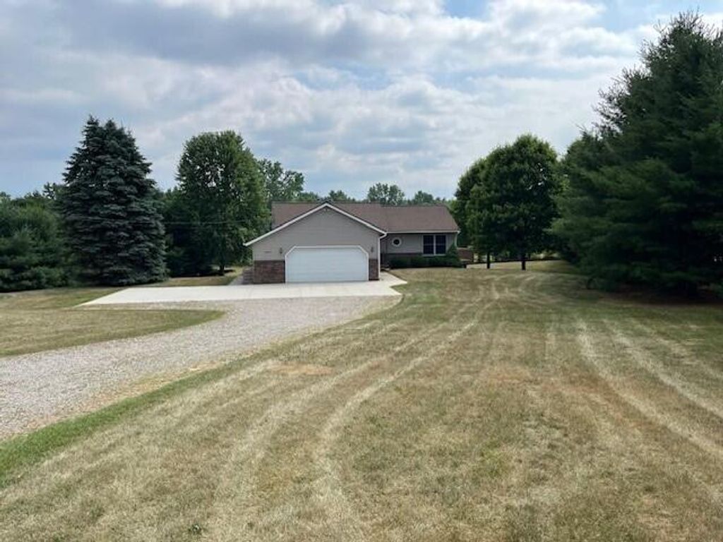 Photo of 10050 Sussex Court NE, Rockford, MI 49341 (MLS # 25052474)