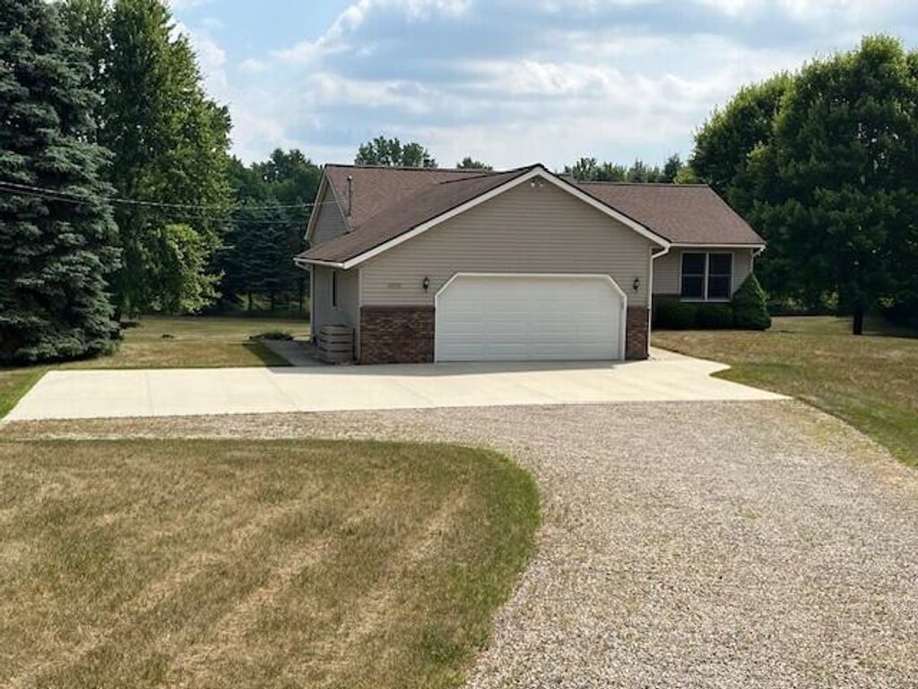 Photo of 10050 Sussex Court NE, Rockford, MI 49341 (MLS # 25052474)