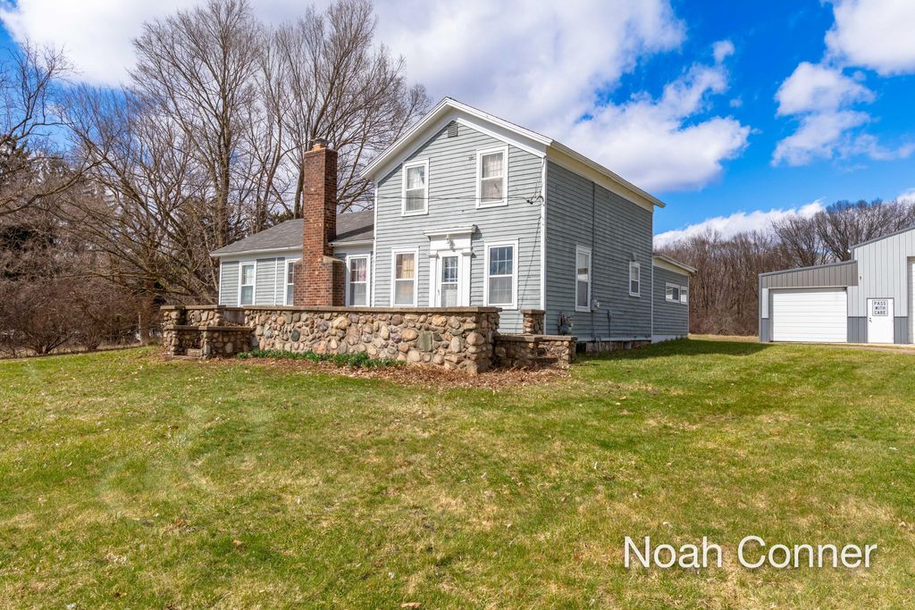 Photo of 5295 Belding Road NE, Rockford, MI 49341 (MLS # 26012327)