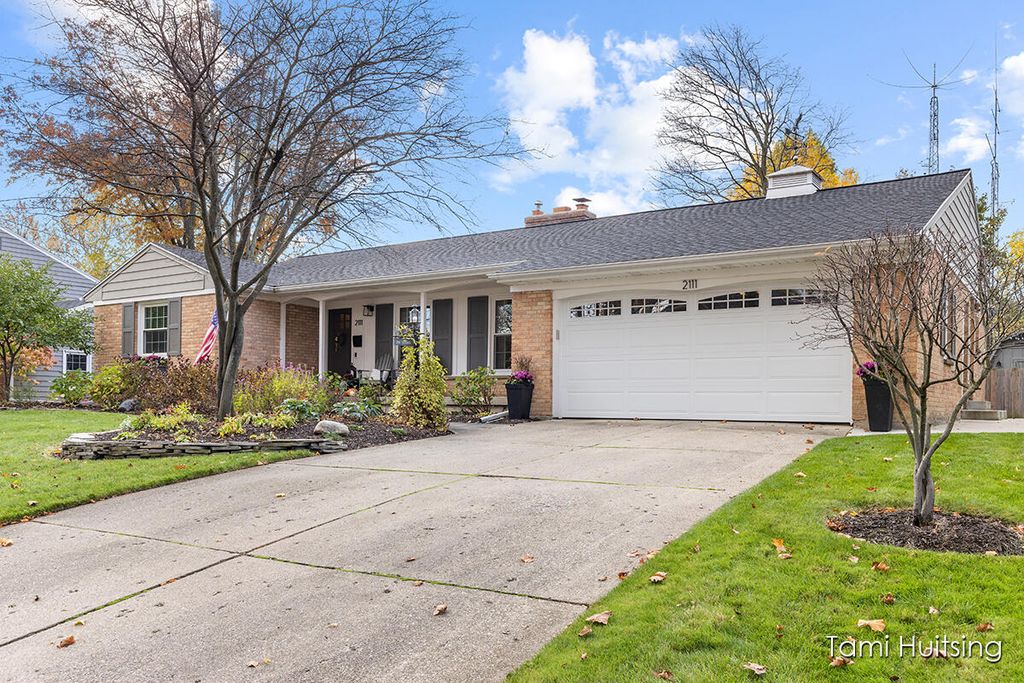 Photo of 2111 Chesaning Drive SE, Grand Rapids, MI 49506 (MLS # 23140472)