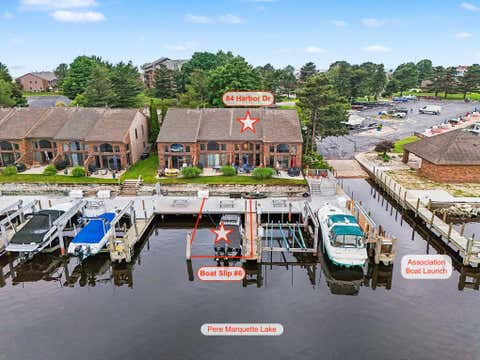 Photo of 84 Harbor Drive, Ludington, MI 49431 (MLS # 26032051)