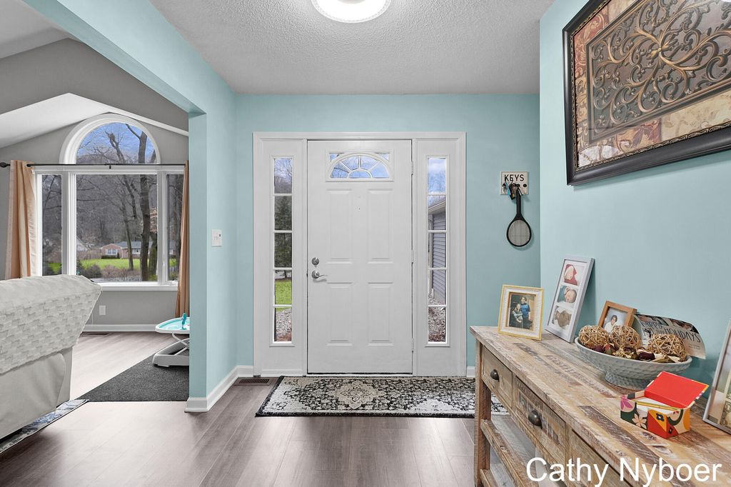 Photo of 13478 Lakeshore Avenue, Grand Haven, MI 49417 (MLS # 26008522)