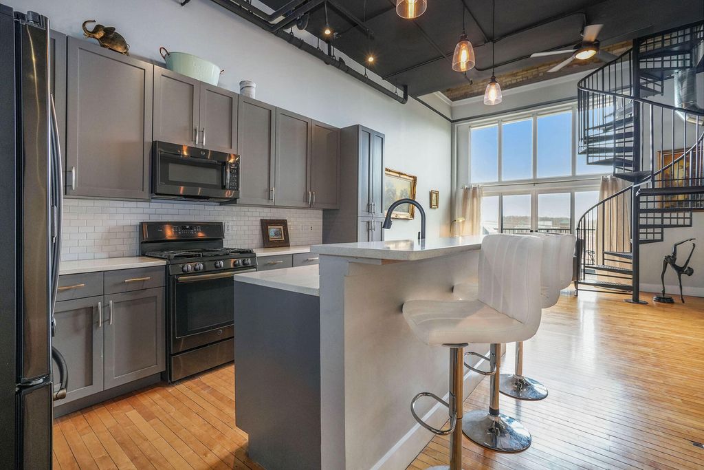 Photo of 600 Broadway Avenue NW #426, Grand Rapids, MI 49504 (MLS # 23009200)