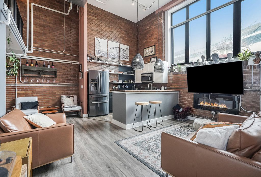 Photo of 600 Broadway Avenue NW #116A, Grand Rapids, MI 49504 (MLS # 24016350)