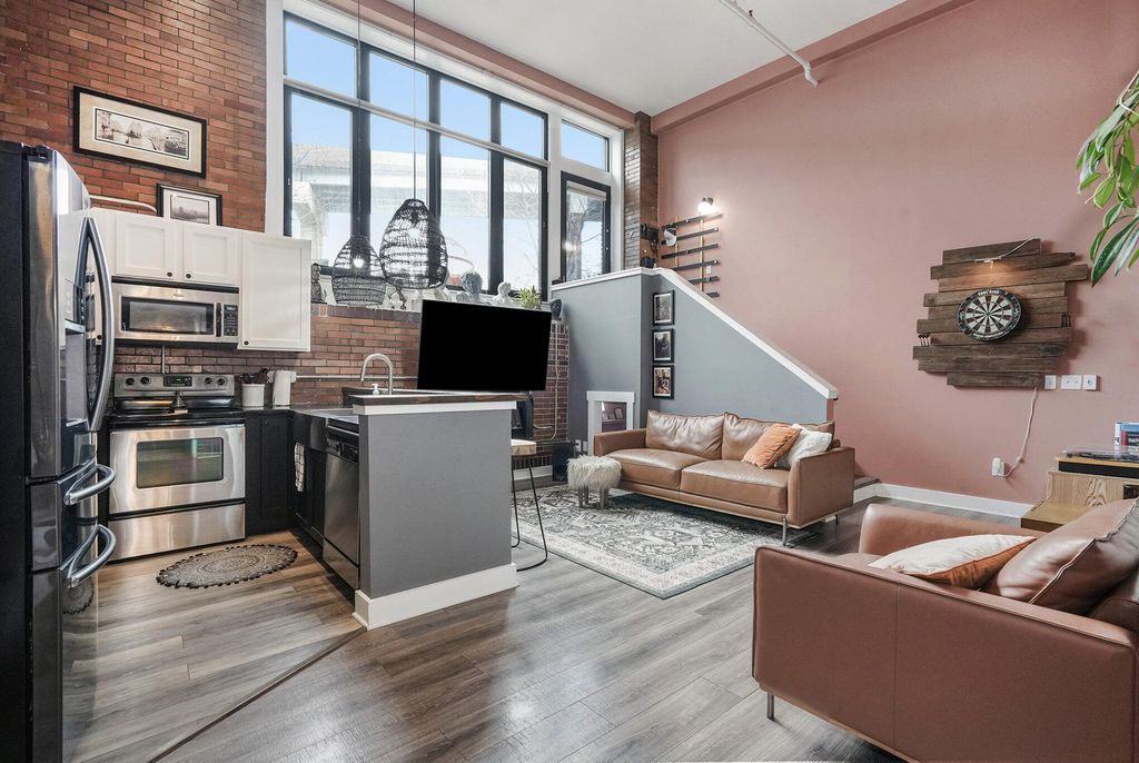 Photo of 600 Broadway Avenue NW #116A, Grand Rapids, MI 49504 (MLS # 24016350)