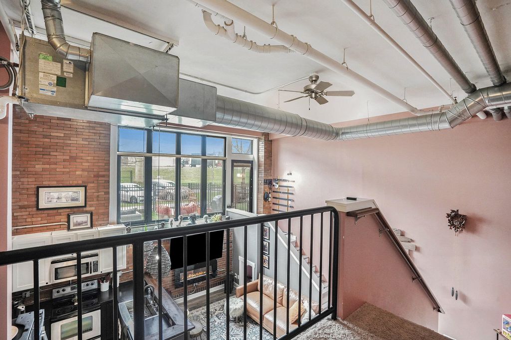 Photo of 600 Broadway Avenue NW #116A, Grand Rapids, MI 49504 (MLS # 24016350)