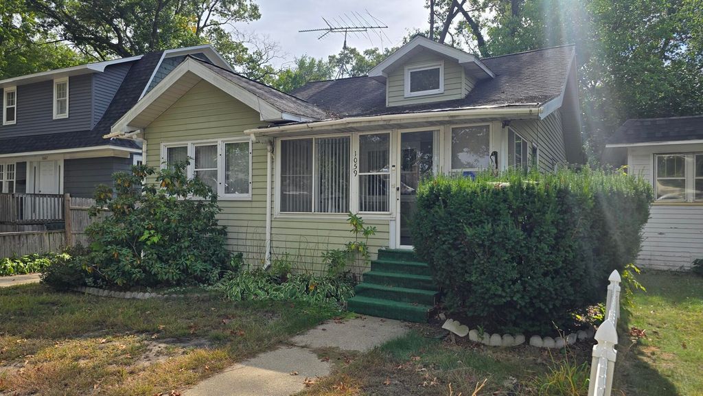 Photo of 1059 Ada Avenue, Muskegon, MI 49442 (MLS # 25050460)