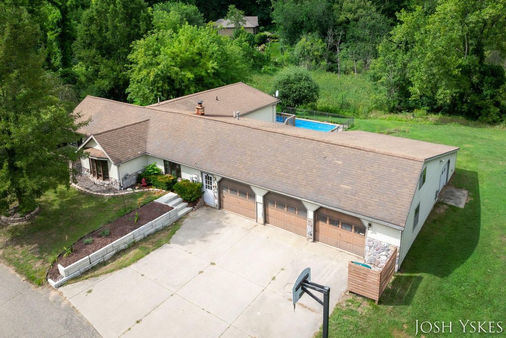 Photo of 5855 Grand River Drive NE, Ada, MI 49301 (MLS # 25042493)