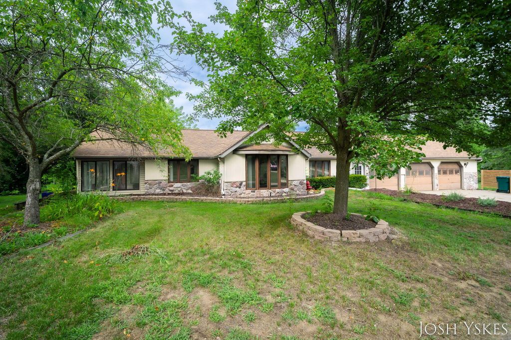 Photo of 5855 Grand River Drive NE, Ada, MI 49301 (MLS # 25042493)