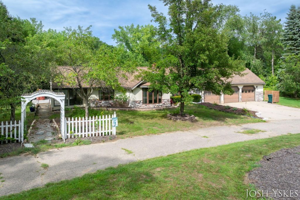 Photo of 5855 Grand River Drive NE, Ada, MI 49301 (MLS # 25042493)