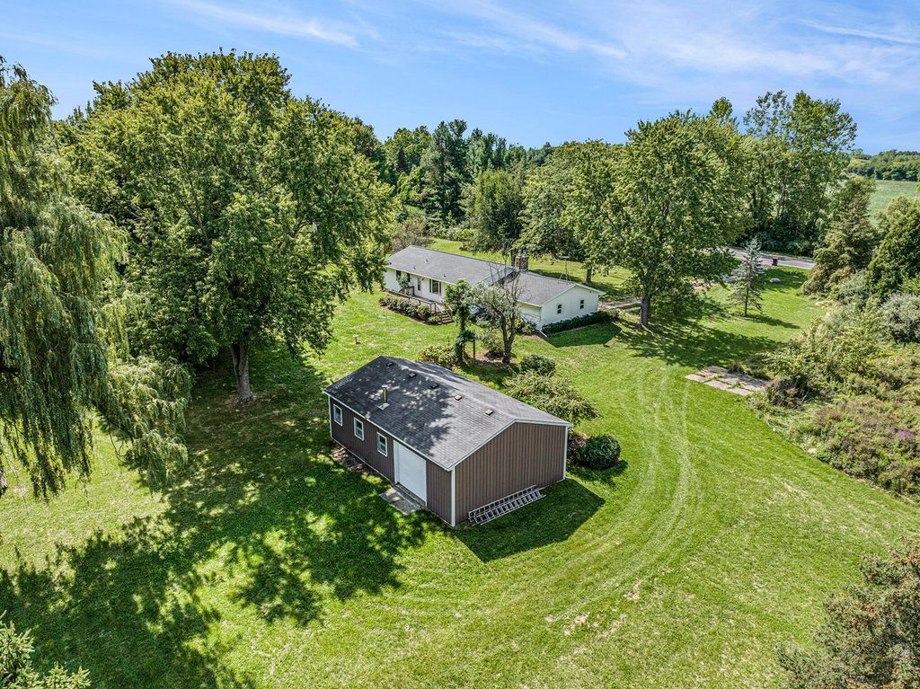 Photo of 10280 Tefft Avenue NE, Rockford, MI 49341 (MLS # 25052368)