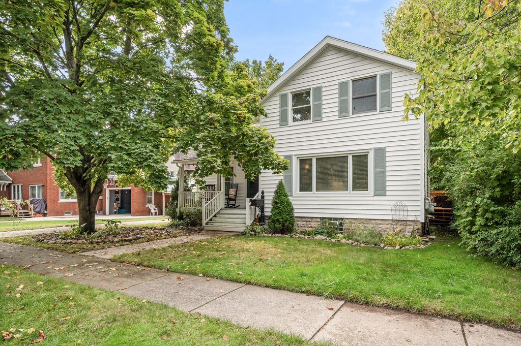 Photo of 414 N Jefferson Street, Lowell, MI 49331 (MLS # 25050347)