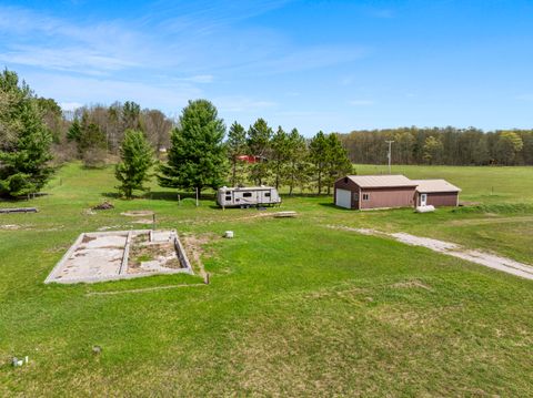 Photo of 167 N Pioneer Road, Beulah, MI 49617 (MLS # 26018471)