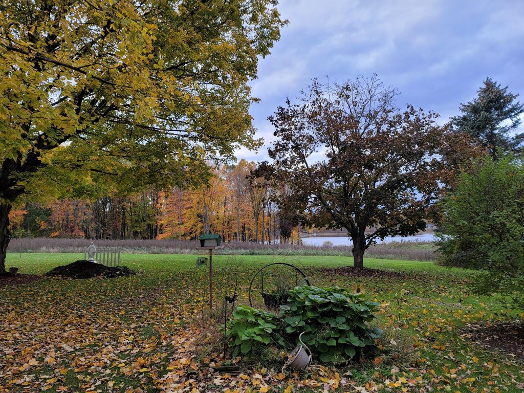 Photo of 4885 Gavin Lake Road NE, Ada, MI 49301 (MLS # 26002817)