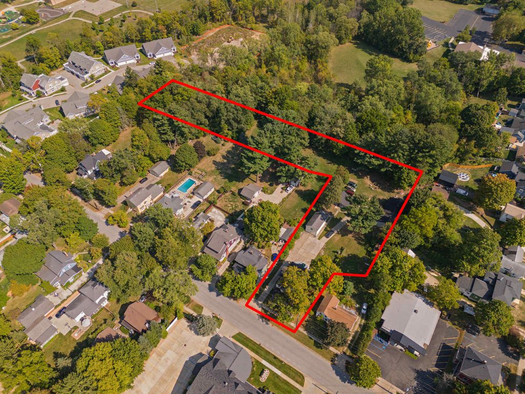 Photo of 126 N Monroe Street, Rockford, MI 49341 (MLS # 25049699)