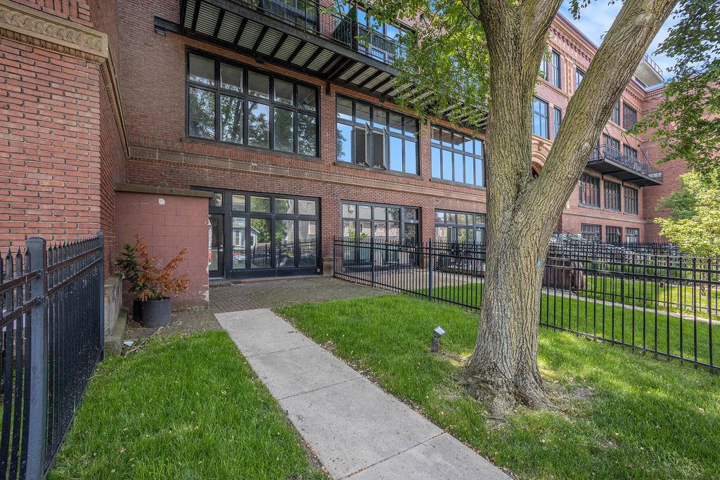 Photo of 600 Broadway Avenue NW #107, Grand Rapids, MI 49504 (MLS # 24025934)