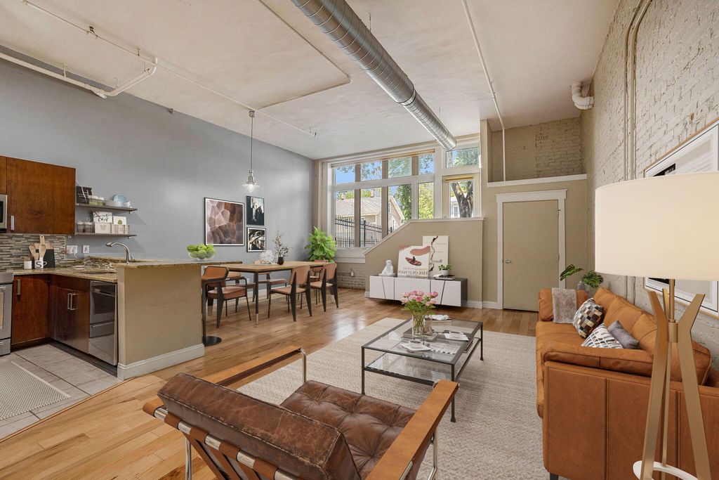 Photo of 600 Broadway Avenue NW #107, Grand Rapids, MI 49504 (MLS # 24025934)