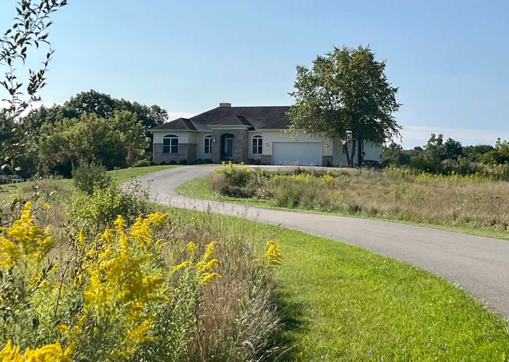 Photo of 8866 Cascade Road SE, Ada, MI 49301 (MLS # 25046318)
