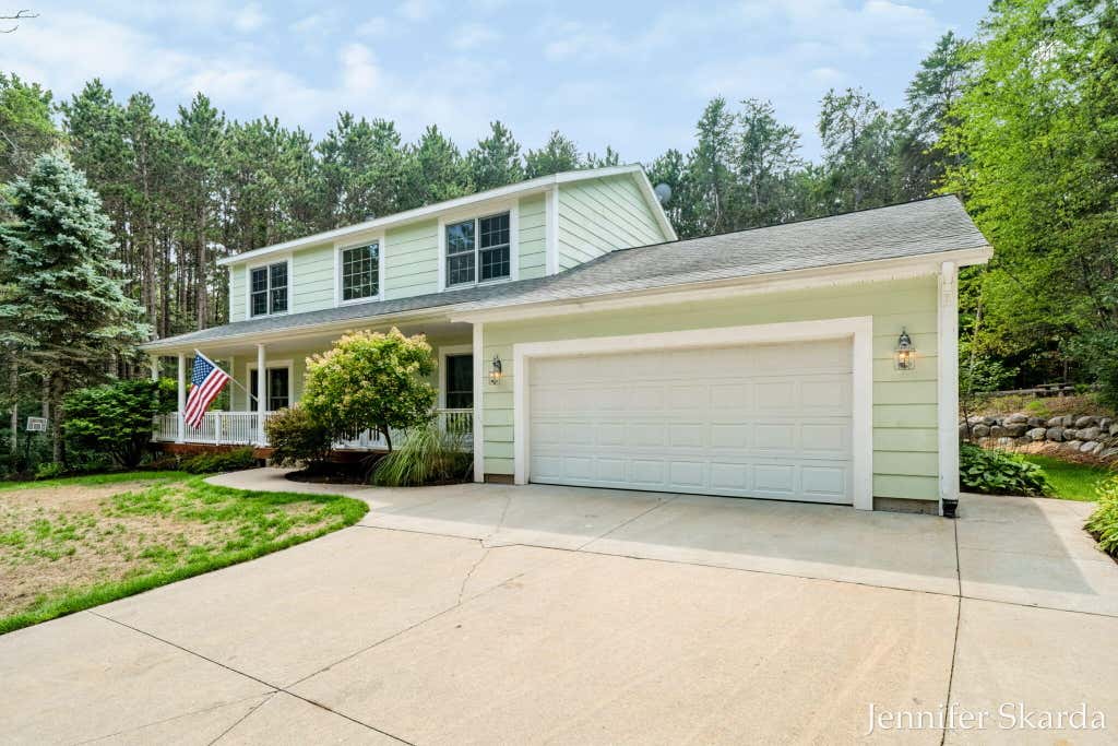 Photo of 4530 Summit Forest Drive NE #14, Rockford, MI 49341 (MLS # 26042774)