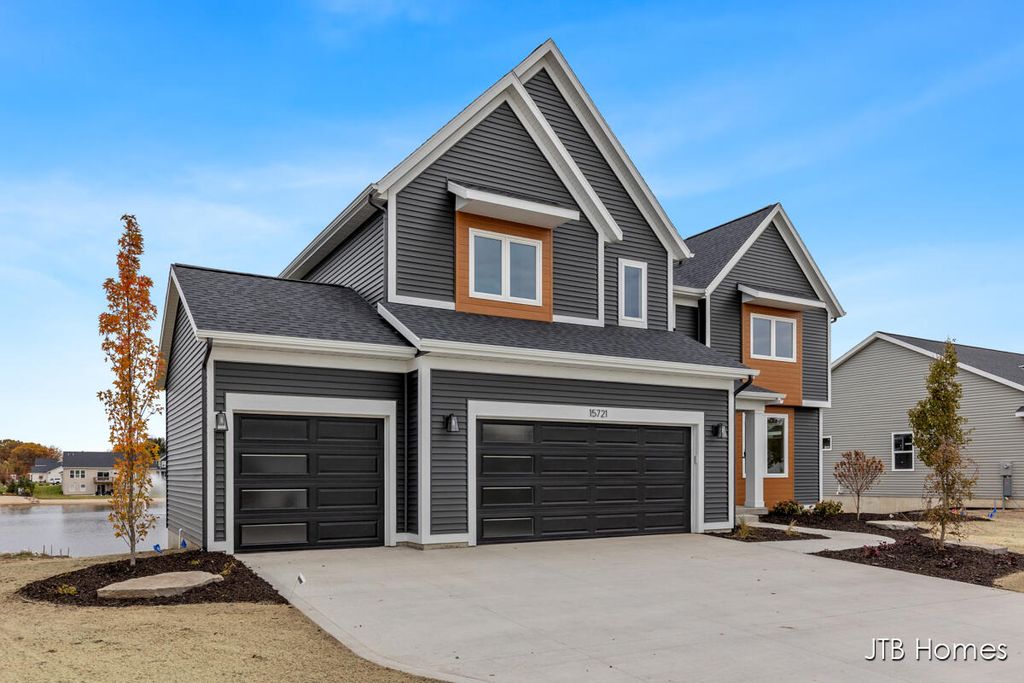 Photo of 15721 Norwalk Road, Grand Haven, MI 49417 (MLS # 25038865)