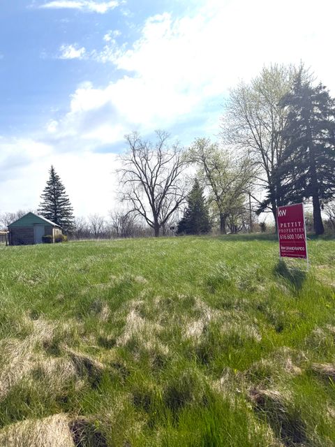 Photo of 3290 Breton Road SE, Grand Rapids, MI 49512 (MLS # 26016874)