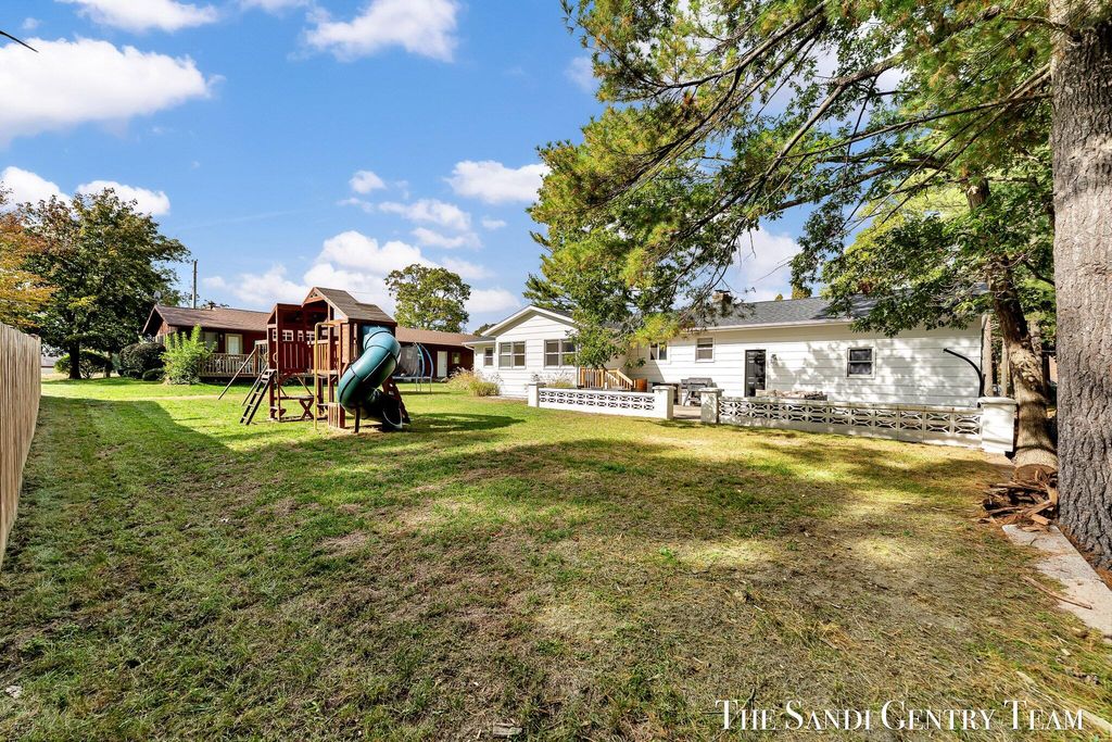 Photo of 904 E Savidge Street, Spring Lake, MI 49456 (MLS # 25053118)