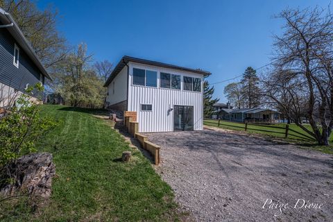 Photo of 11069 Crooked Lake Drive NE, Rockford, MI 49341 (MLS # 26017270)