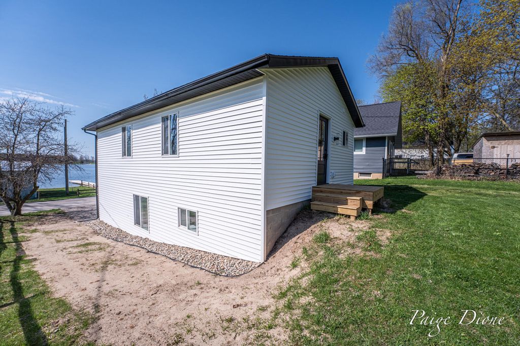 Photo of 11069 Crooked Lake Drive NE, Rockford, MI 49341 (MLS # 26017270)